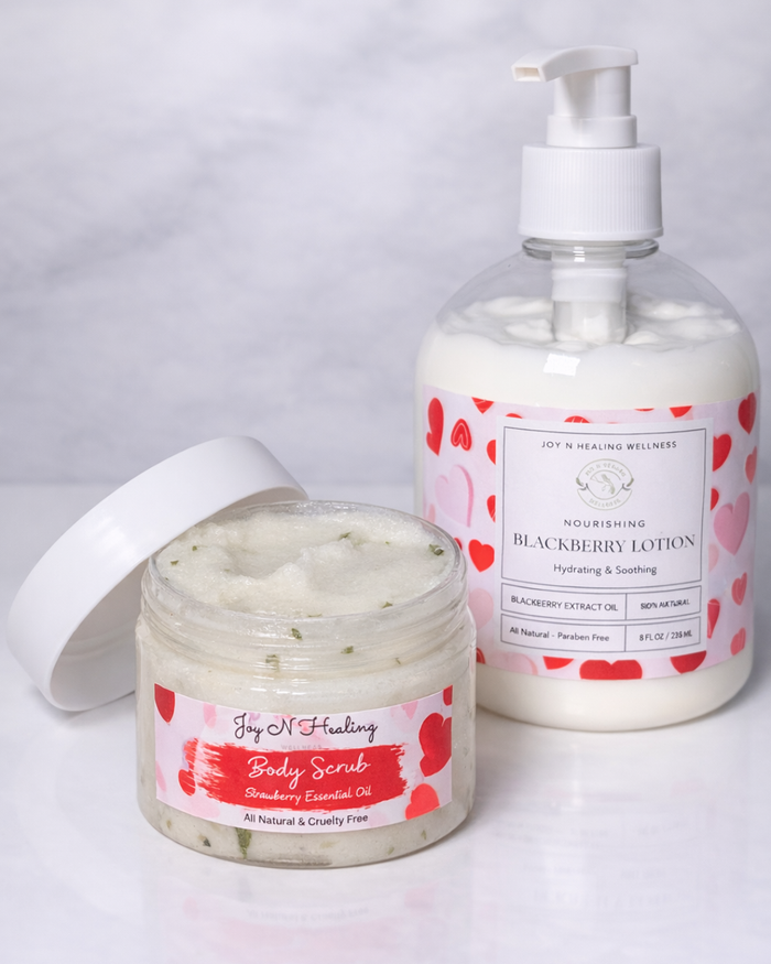 Jar of body scrub and bottle of lotion with visible labels on a white background