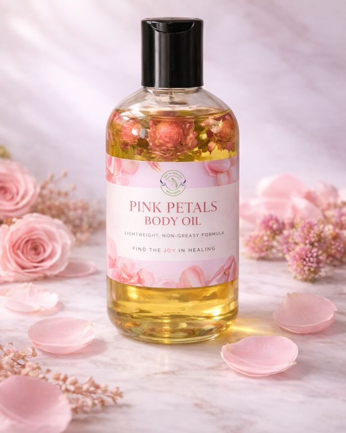 Pink Petals body oil bottle with floral design on a light background